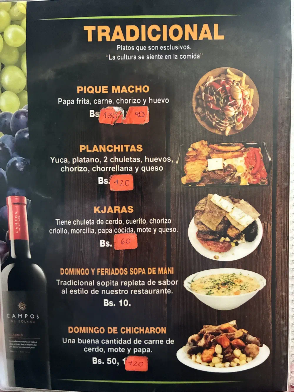 Menu page headed Tradicional, listing pique macho, planchitas and kjaras