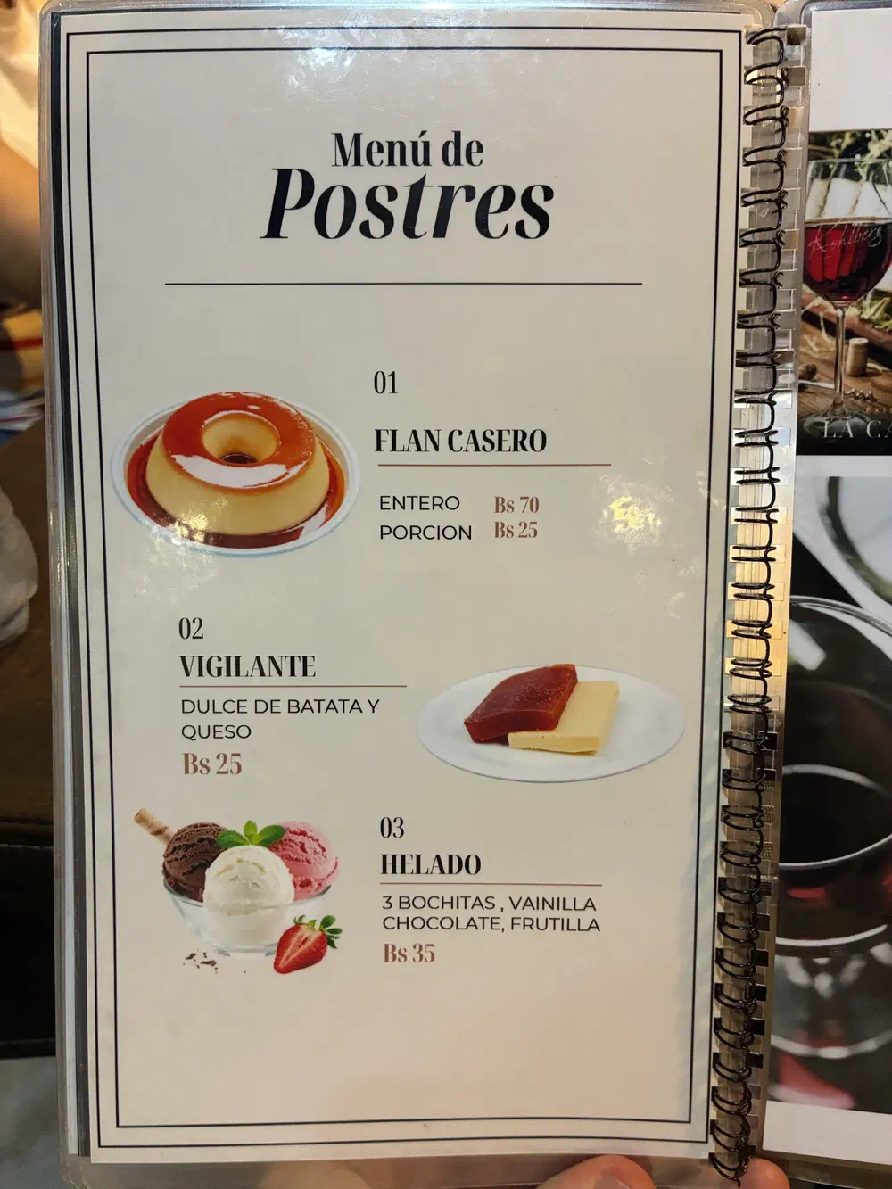 Dessert menu listing flan casero, vigilante with quince and cheese, and ice cream