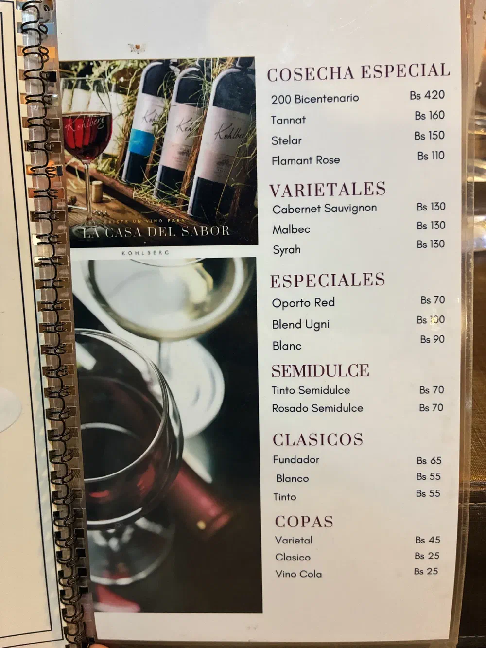 Wine list grouped into cosecha especial, varietales, especiales, semidulce and clasicos, with prices by bottle and glass