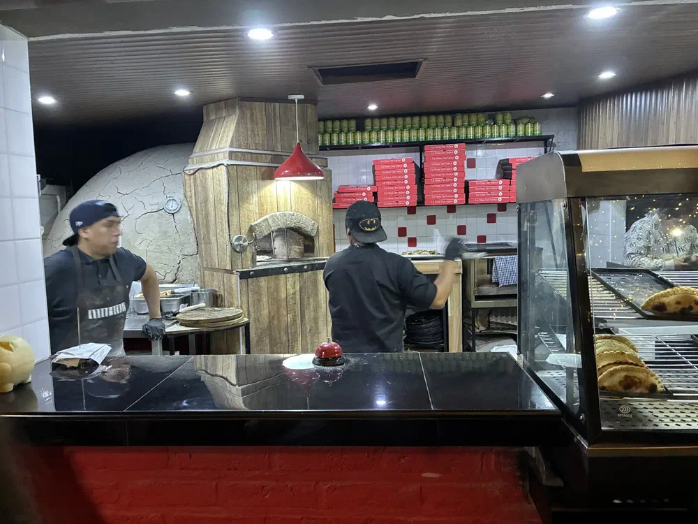 The wood fired oven where the pizza is cooked