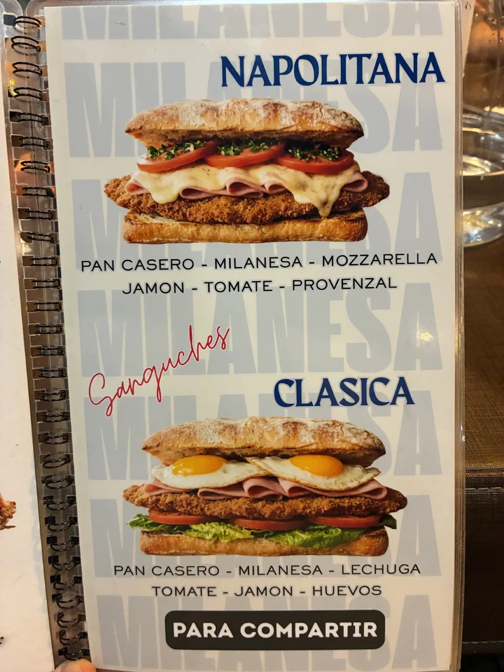 Menu page for sanguches, showing the Napolitana and Clasica milanesa sandwiches on house bread