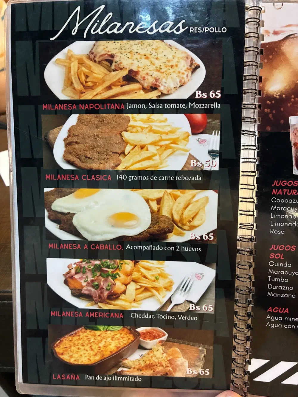 Menu page for milanesas of beef or chicken, listing five variations with photographs and prices
